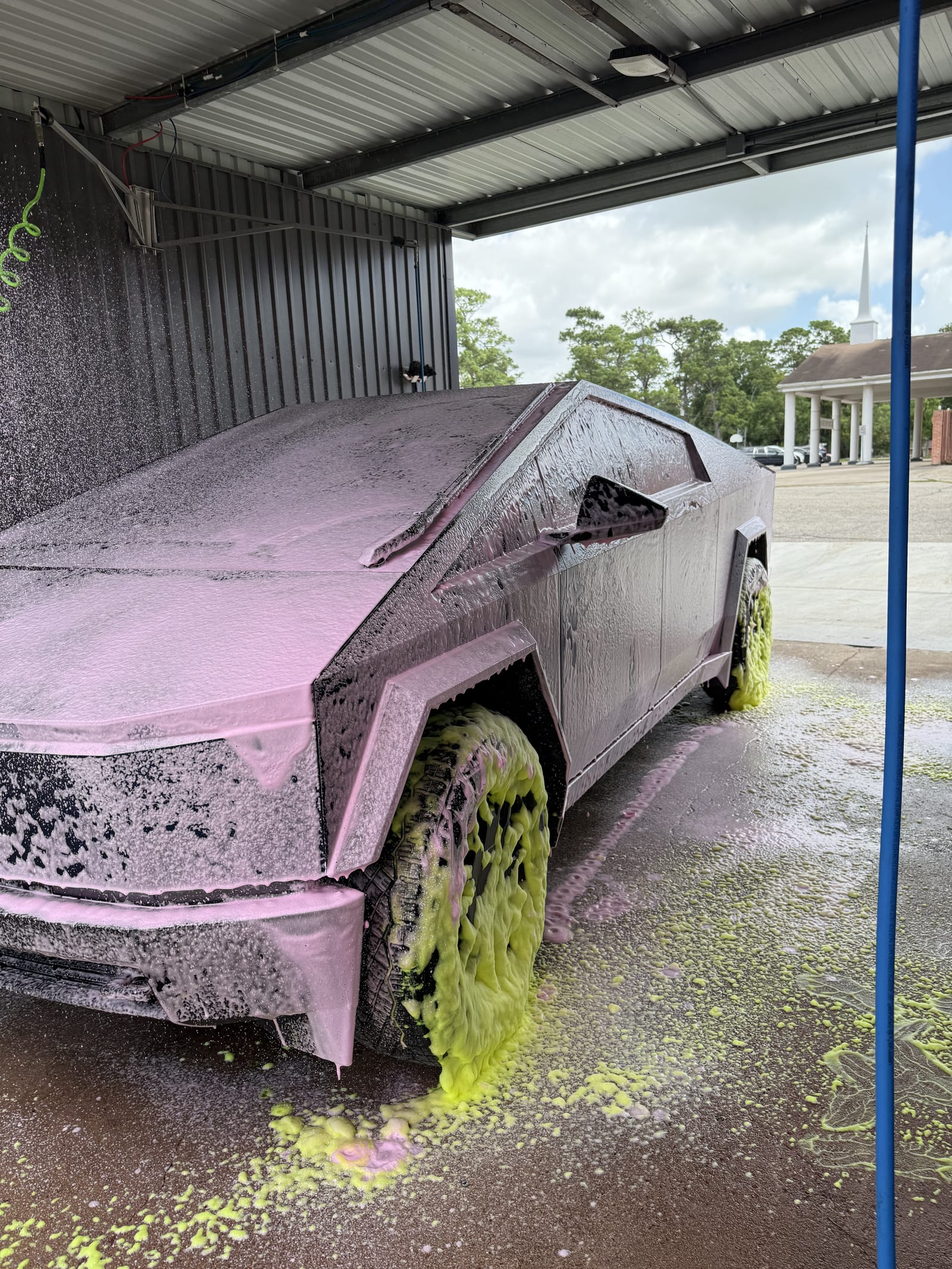 Presoak being applied at a self-serve bay at Gilbert's Car Wash Dickinson.