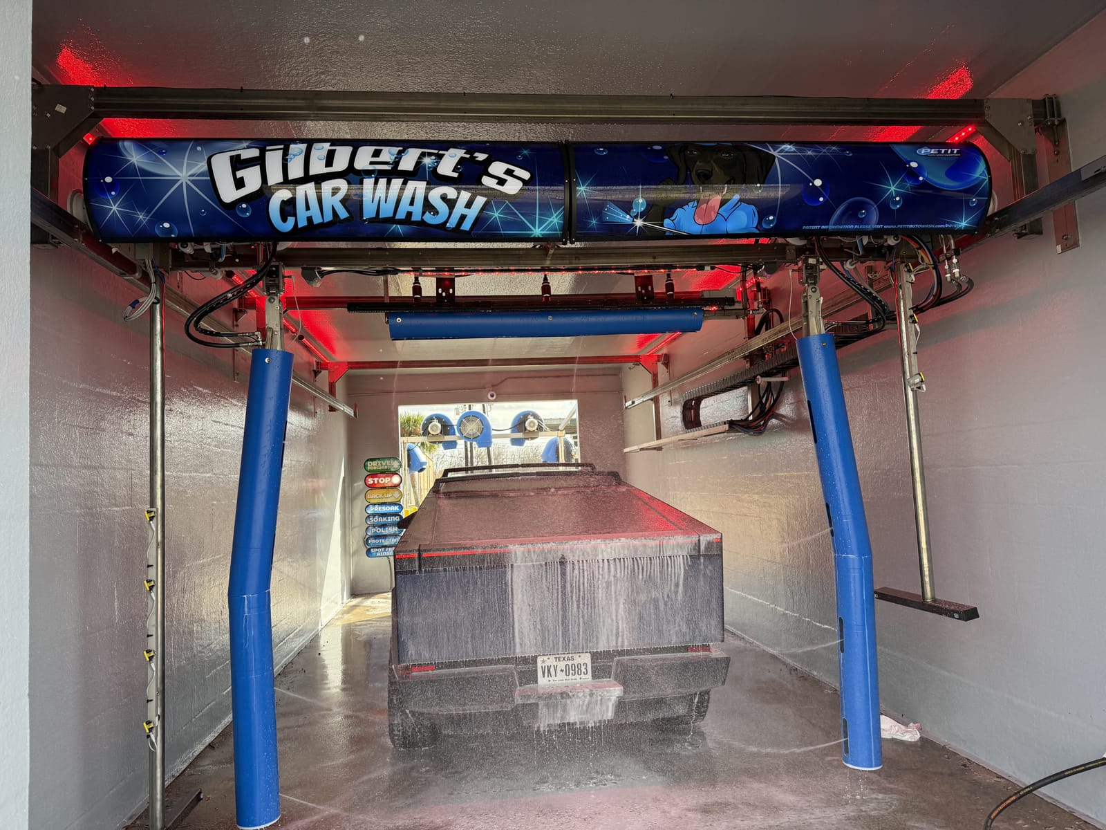 A vehicle entering the touchless automatic wash at Gilbert's Car Wash Victoria.
